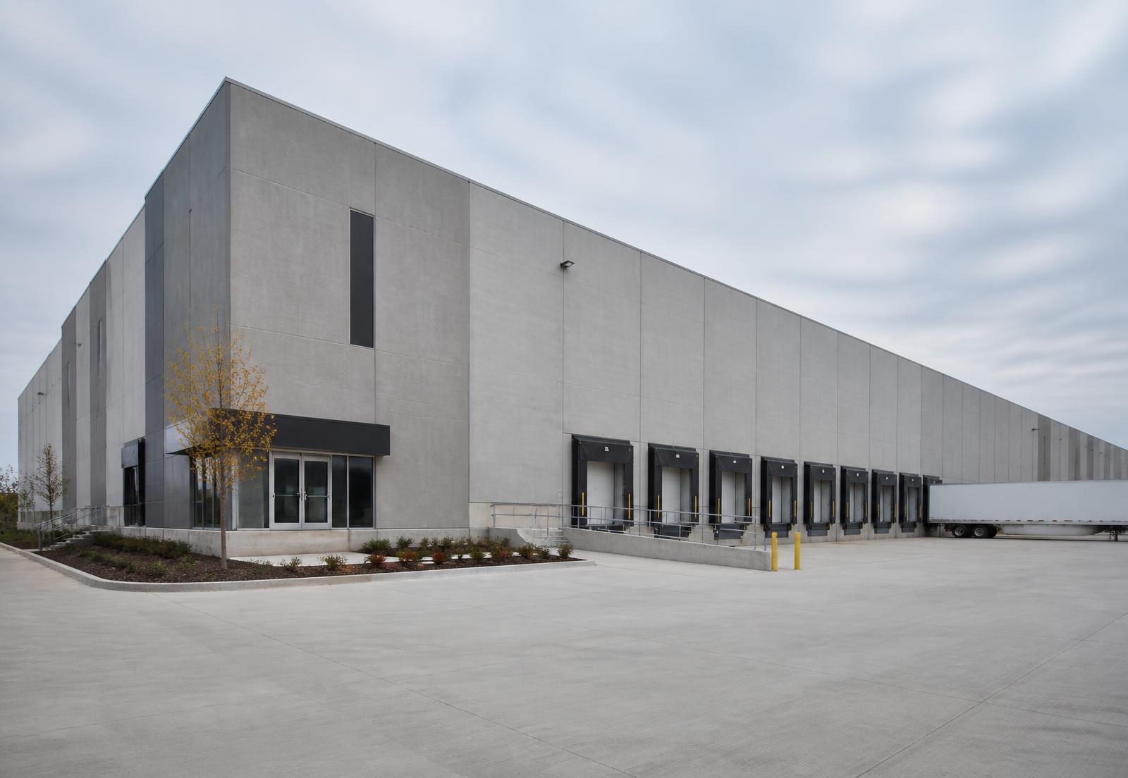 Industrial commercial building with concrete tilt-wall construction and loading bays